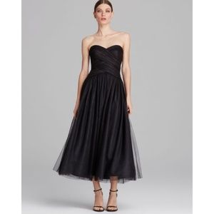 Monique Lhuillier black strapless tea length gown